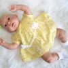 AD8e Levensechte Babypop Kristina softbody bruine ogen in geel gebloemd en speen 52 cm - Afbeelding 10
