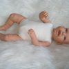 AD8m Levensechte Babypop Lily softbody met wafelpakje met hoofdband roze en speen 52 cm - Afbeelding 14