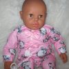 P13a Grote Babypop soft body getint  60 cm in roze kleding en speen - Afbeelding 2