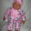 P13a Grote Babypop soft body getint  60 cm in roze kleding en speen - Afbeelding 4