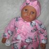 P13a Grote Babypop soft body getint  60 cm in roze kleding en speen - Afbeelding 3